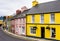 EYERIES, IRELAND - AUGUST 14, 2018: Main road with colorful house line