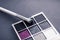 Eyeshadow palette and make-up brush on graphite background, eye shadows cosmetics product for luxury beauty brand promotion and