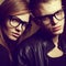 Eyewear concept. Portrait of gorgeous red-haired fashion twins in black leather clothes wearing trendy glasses and posing over