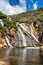 Ezaro waterfall, Galicia, Northern Spain in Spring. It empties into the Atlantic ocean in a waterfall