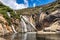 Ezaro waterfall, Galicia, Northern Spain in Spring. It empties into the Atlantic ocean in a waterfall