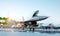 F 16 military fighter jet. military base. sunset. 3d rendering.