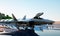 F 22 raptor, military fighter jet. military base. sunset. 3d rendering.