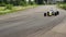 F1 racing car driving wildly, taking extremely sharp turn