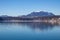 Faakersee - A panoramic view on the Faaker lake in Austrian Alps. The lake is surrounded by high mountains. Calm surface