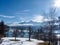 Faakersee - A panoramic view on the Faaker lake in Austrian Alps in winter. The lake is surrounded by high mountains