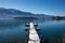 Faakersee - Snow covered wooden pier on lake Faak in Carinthia, Austria, Europe
