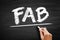 FAB - Feature Advantage Benefits acronym, business concept on blackboard