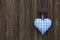 Fabric blue and white checked heart in bavarian style hanging on