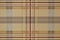 Fabric brown plaid. Brown check pattern. Tartan design as background. Checked fabric.