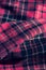 Fabric with a colorful checked pattern. Pink check fabric