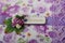 Fabric covered weddig scrapbook album with purple lace, flowers and inscription Handmade. Soft focused close up