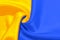 Fabric curved flag of Ukraine, UA. Blue and yellow colors