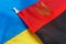 Fabric curved flag of Ukraine, UA. Blue and yellow colors.Ukrainian passport.Stop war.Patriotism.Concept of Ukraine.Democracy and