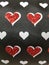 fabric with design of figures of hearts, textured background