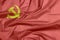 Fabric flag of Democratic Kampuchea, golden hammer and sickle on red