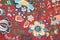 Fabric pattern with classical image of the colorful flowers on r