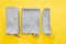Fabric pencil cases on yellow background