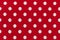 Fabric with red and white polka dots pattern