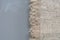 Fabric sackcloth texture on a gray background.Burlap texture. Pattern fabric textile.