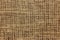 Fabric texture of burlap in neutral colors close up