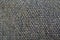 Fabric texture of coarse burlap gray. Knitting