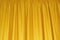 Fabric yellow curtains. Abstract background, curtain, drapes gold fabric