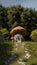 Fabulous beautiful mushroom house in field. Small house of gnome in form of mushroom on background of forest. 3d render