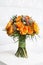 Fabulous bouquet of orange roses and other flowers