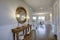 Fabulous foyer features a wood console table