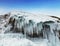 Fabulous ice icicles on the rocks of lake Baikal. Eastern Siberia,