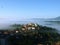 Fabulous landscape of the foggy morning in Tuscany.