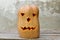 A fabulous monster pumpkin head lantern stands on the table