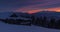 Fabulous winter sunset and hut in Carpathian Mountains