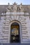 facade and access door on the outside of the Vatican museum.