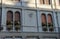 Facade of ancient building on the main tourist street in Rimini, Italy