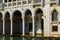 Facade of an ancient flooded palazzo. Venice