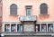 Facade with balconies and colored panels of a building in the center of Padua