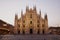 Facade of the beautiful historic Duomo building at night. Milan Italy 08.2020