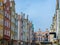 Facade of beautiful typical colorful houses buildings and Academy of Fine Arts Great Armory with amazing facade and towers with