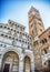 Facade and bell tower of Lucca Cathedral, Italy