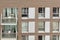 Facade of a block of flats.  Block windows and balconies