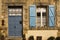 Facade with blue door and shutter