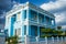 Facade of a blue mansion at the Malecon Boulevard in Cienfuegos, Cuba