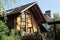 Facade of a brown wooden private house