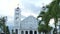 Facade catholic cathedral with statue Virgin Mary and Jesus Christ. Religious architecture Catholic Church with crosses