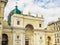 The facade of Catholic Church of St Catherine with monumental arched portal on self-supporting columns and the massive cupola