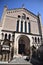 Facade of the church of San Fermo Maggiore looking at the statue, which is located beyond the street in front, of Umberto I.