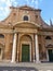 Facade of the church of Santa Maria dell`Orto in the Tratevere district to Rome in Italy.