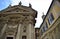 Facade of the church of St. Catherine in Graz and the upper part of an elegant building.